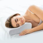 Woman using occipital neuralgia pillow